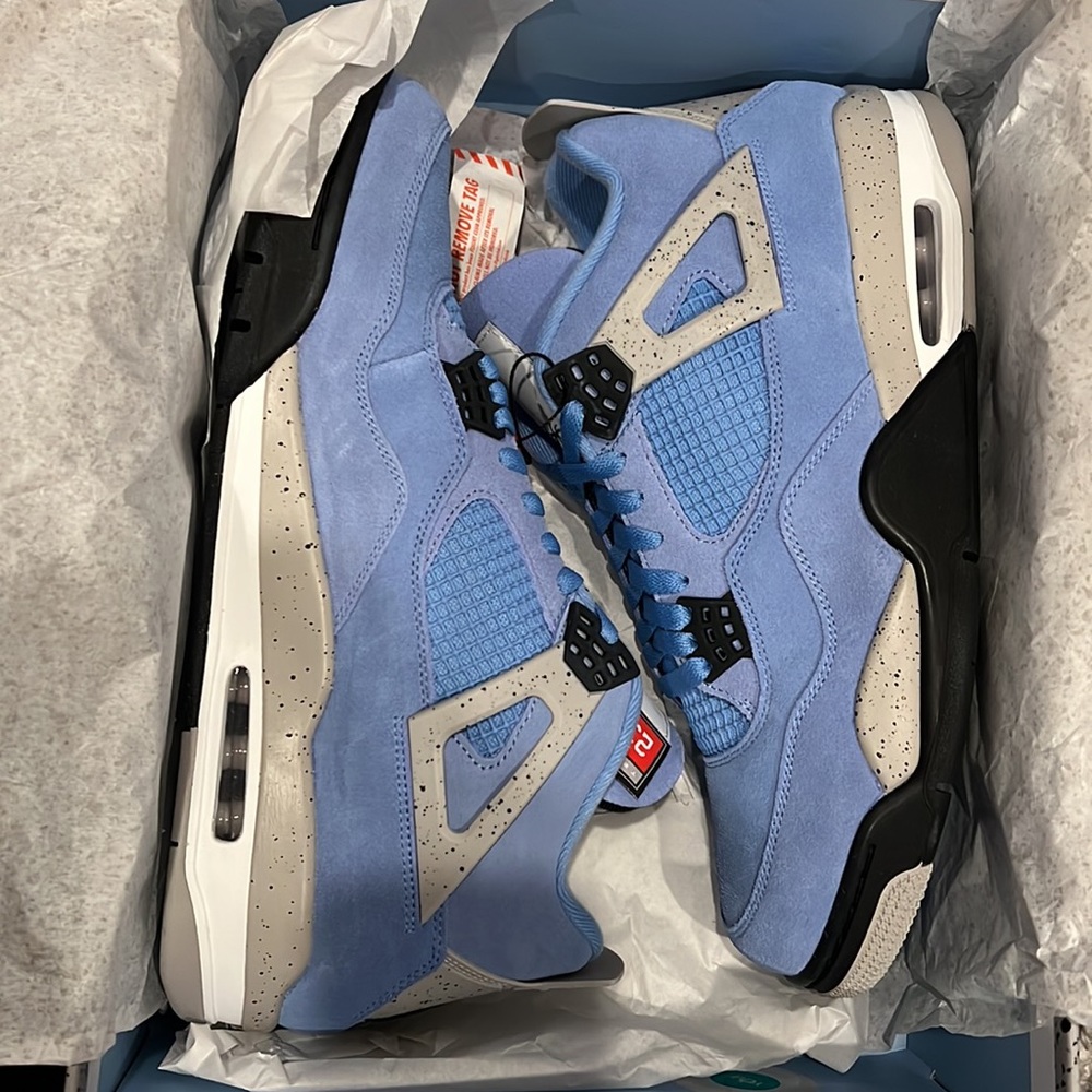 New. Air Jordan 4 retro. Size 12. University blue/black
